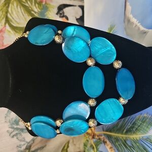 Chunky Necklace with blue stones gold balls in between good color for summer
